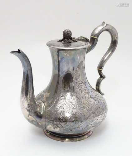 A silver plate coffee pot by Elkington & Co.Approx. 9