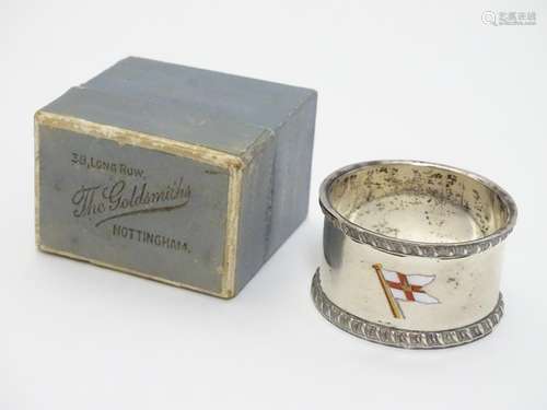 A Silver napkin ring with enamel depiction of a shipping line flag upon, possibly the Elder Dempster