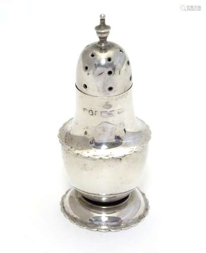 A silver pepperette hallmarked Chester 1903 maker E J Trevitt & Sons Ltd 2 3/