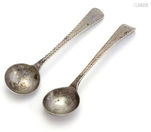 A pair Georgian silver salt spoons with bright cut decoration. Hallmarked London 1790 maker George