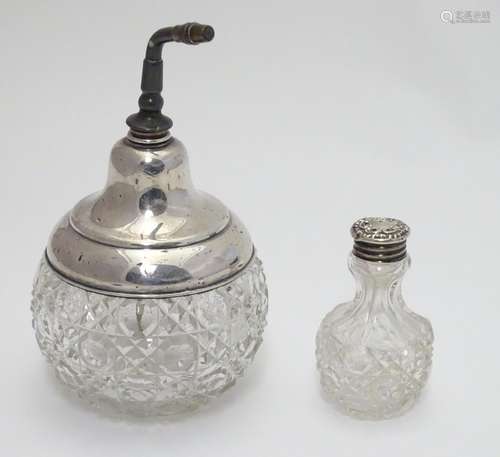 A Sterling silver mounted cut glass atomiser / scent bottle, the hobnail cut glass body with star