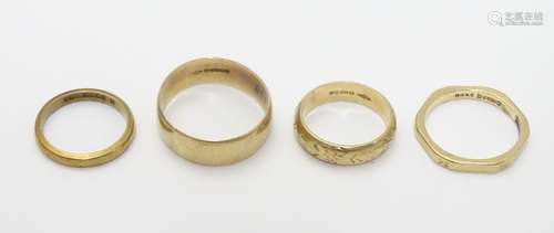 4 Assorted gold rings to include: A 9ct gold band size approx S, A 9ct gold marked 'Fidelity; to