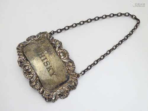 A silver decanter label 'Whiskey' hallmarked London 1962 maker Bohemian Jewellery Ltd Please