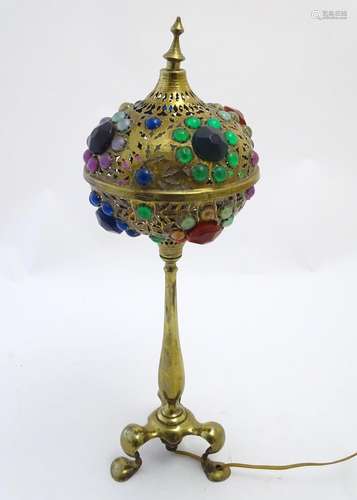 An early-20thC brass Pullman lamp, fitted with an arabesque reticulated shade having inset multi-