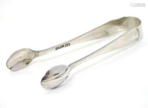 Silver sugar tongs, hallmarked Sheffield 1917, maker Richard Richardson. Approx. 3 1/2