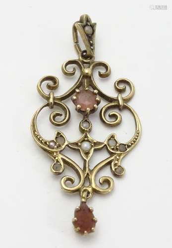 A 9ct gold belle epoque style pendant set with seed pearls etc Approx 1 3/4