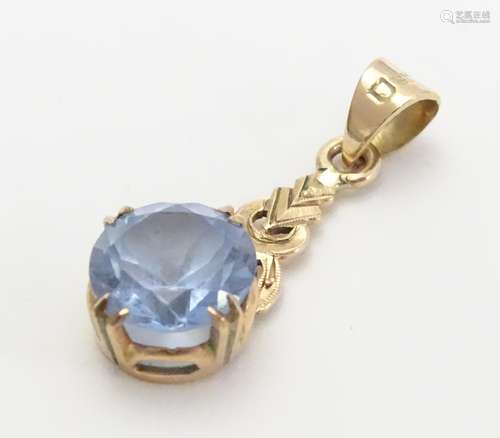 A 9ct gold pendant set with Aquamarine. approx 1