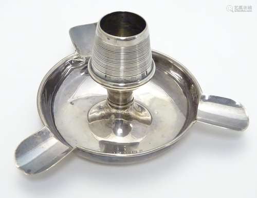 A Silver table vesta/ashtray, the central match holder having a ribbed surface for match striking.