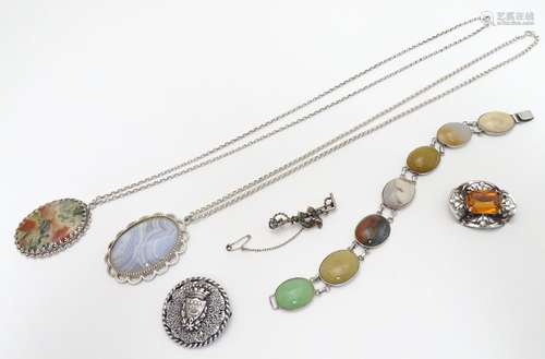 Two silver pendants and chains each set with agate cabochons, one moss agate. Each pendant approx 2