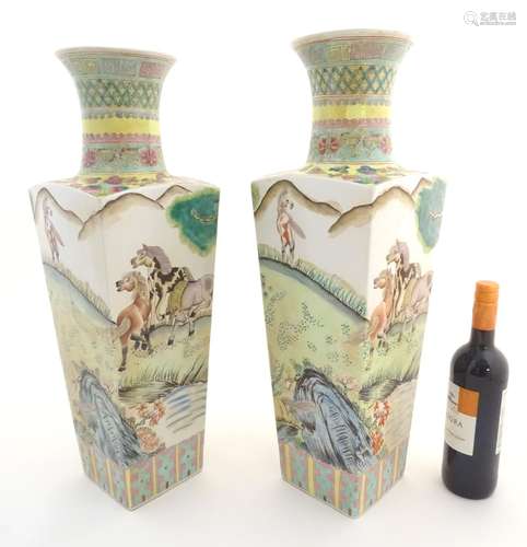 A pair of Chinese square sectional vases with flared rims, decorated with horses in a landscape