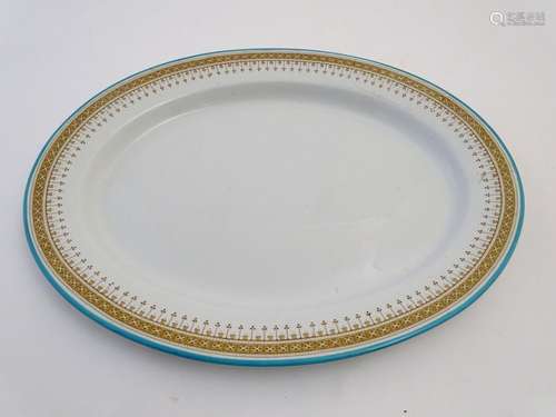 A Victorian Royal Worcester oval serving dish / meat plate, with banded decoration. Marked under.