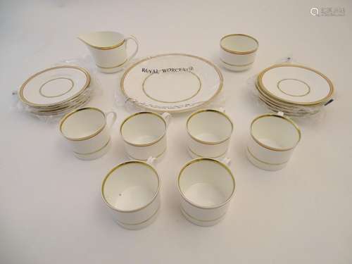 A quantity of Royal Worcester tea wares with decorative gilt and red banding. Comprising 6