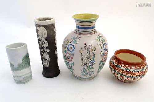 Four assorted vases, comprising A New Mexico Navajo studio pottery squat vase with incised banded