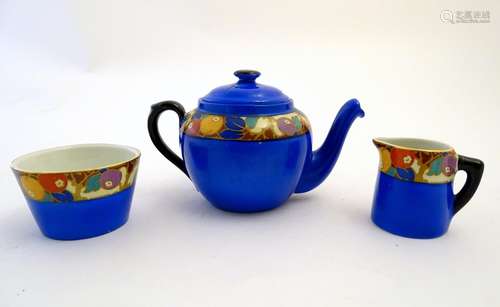 Empire ware tea wares comprising, teapot, sugar bowl and milk jug decorated in the manner of Phoenix