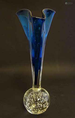 A mid 20thC century art glass vase, of handkerchief form with blue colouration, the clear base of