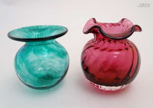 A cranberry Dartington Crystal pot, with lobed exterior, together with a green Hillrace Glass pot,