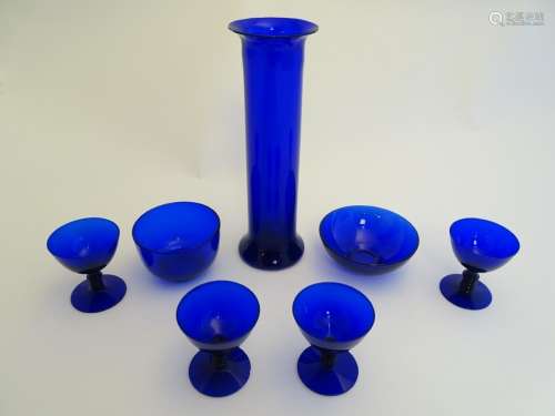 7 assorted items of blue glass comprising drinking glasses, dish, vase etc. The tallest 12 3/4''