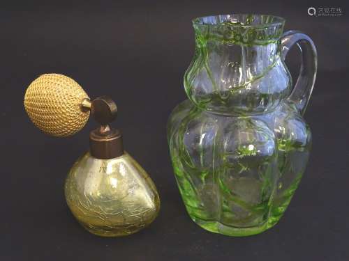 A mid-20thC perfume atomiser, with gold craqulure finish, together with an early 20thC water jug