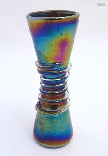 A large 19thC Arts & Crafts glass vase, decorated with a spiral belt and irridescent finish. 13 1/4