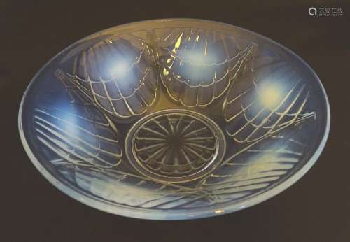 An early 20thC James Jobling & Co glass table bowl, decorated with shell motifs and opalescent
