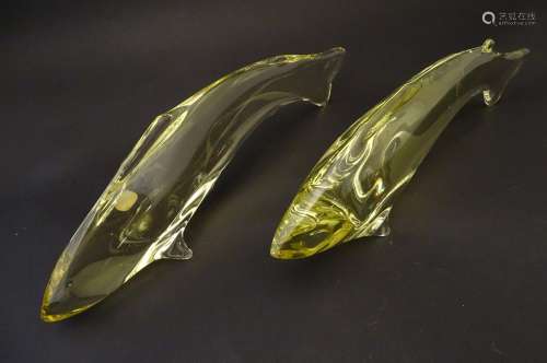 Two studio yellow glass fish ornaments by Bohemia Glass, Czechoslovakia, each labelled, 12 5/8