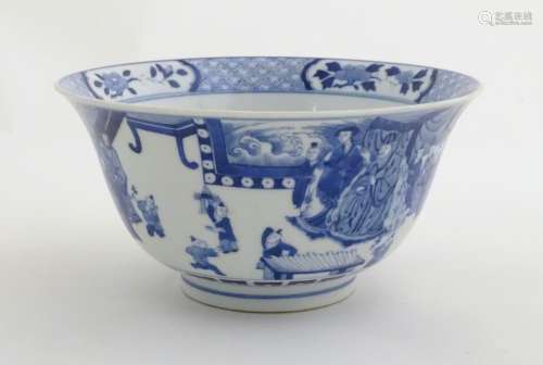 A Chinese blue and white footed bowl with a flared rim, decorated with a scene depicting the