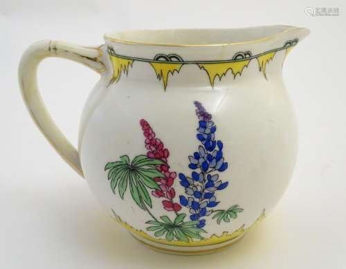 An Art Deco Adderleys jug in the pattern Lupin, with stylised flower decoration. Marked under