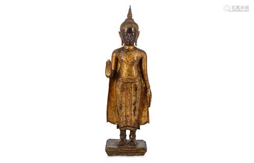 A BRONZE SOUTH-EAST ASIAN FIGURE OF A BUDDHA.