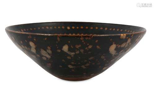 A CHINESE SLIP-DECORATED CONICAL BOWL.