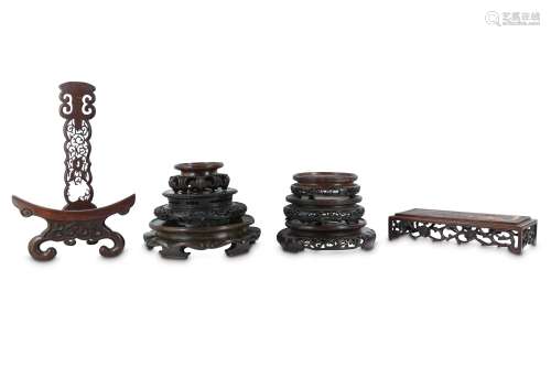 SIX CHINESE CIRCULAR WOOD STANDS, A RECTANGULAR STAND ANS A PLATE STAND.