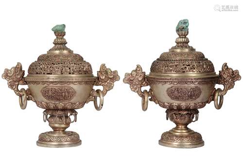 A PAIR OF TIBETAN WHITE METAL INCENSE BURNERS AND COVERS.