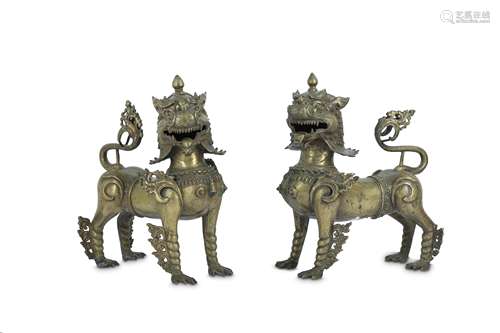 A PAIR OF BRONZE LION DOG GUARDIANS.