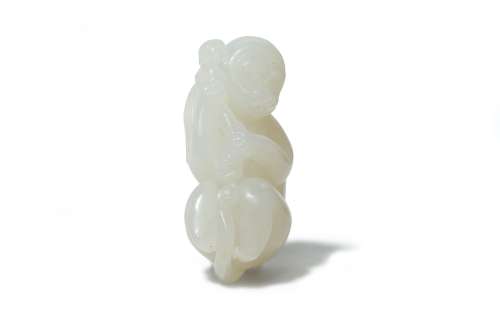 A CHINESE WHITE JADE CARVING OF A MONKEY.
