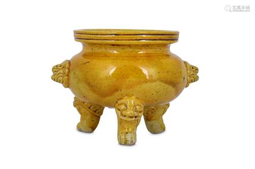 A CHINESE YELLOW-GLAZED TRIPOD INCENSE BURNER.