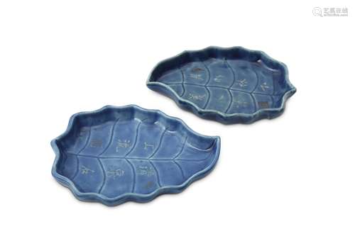 A PAIR OF CHINESE BLUE-GLAZED 'LEAF' TRAYS.