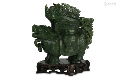 A CHINESE SPINACH-GREEN JADE ‘BULL’ VESSEL AND COVER, ZUN.