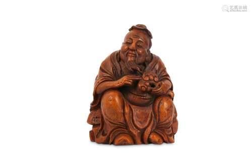 A CHINESE BAMBOO CARVING OF A SAGE.