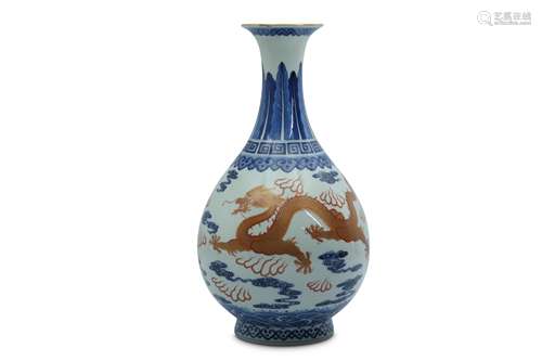 A CHINESE BLUE AND WHITE AND OVERGLAZE RED 'DRAGON' BOTTLE VASE.