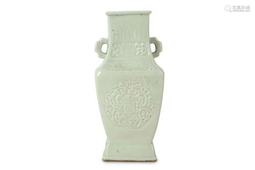 A CHINESE CELADON-GLAZED MOULDED VASE.