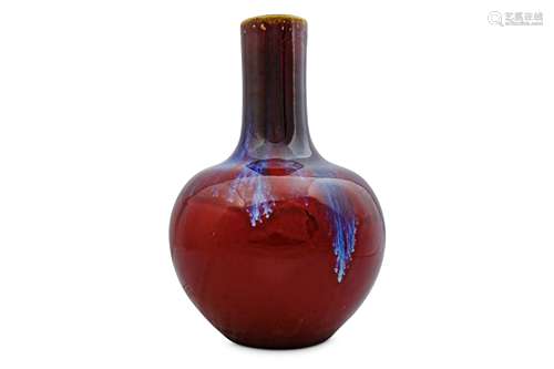 A CHINESE FLAMBE-GLAZED BOTTLE VASE.