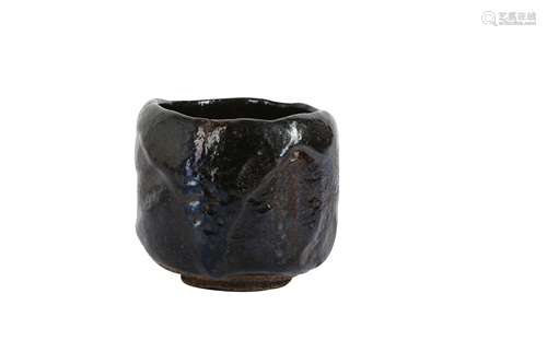 A BLACK RAKU TEA-BOWL (CHAWAN).