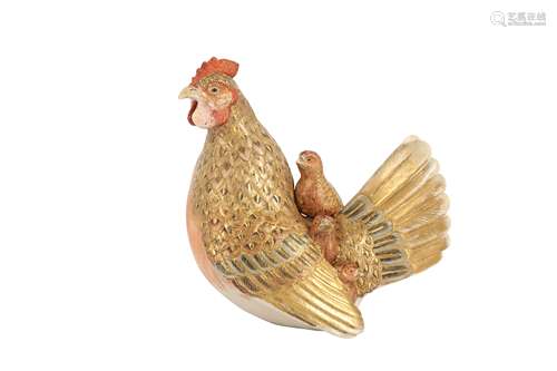 A JAPANESE EARTHENWARE MODEL OF FOWLS.