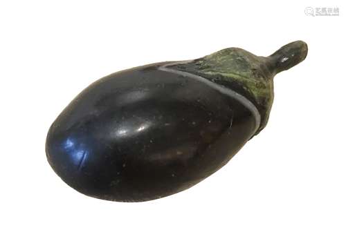 A JAPANESE WAX MODEL OF AN AUBERGINE.