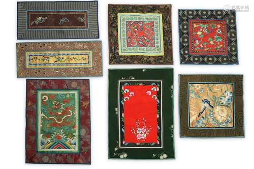 TWENTY-ONE CHINESE EMBROIDERED PANELS.