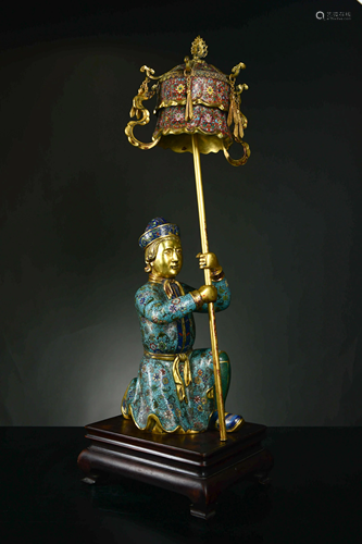 A Cloisonne Enamel statue of a Northern barbarian present a treasure