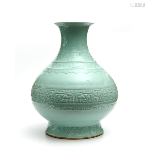 A Large and Rare Celadon Glazed Floral Carved Porcelain Zun
