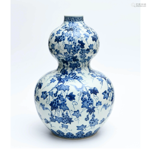 A Blue and White Floral Porcelain Gourd-Shaped Vase