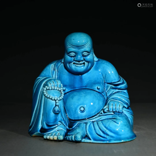 A Blue Glazed Porcelain Maitreya Statue