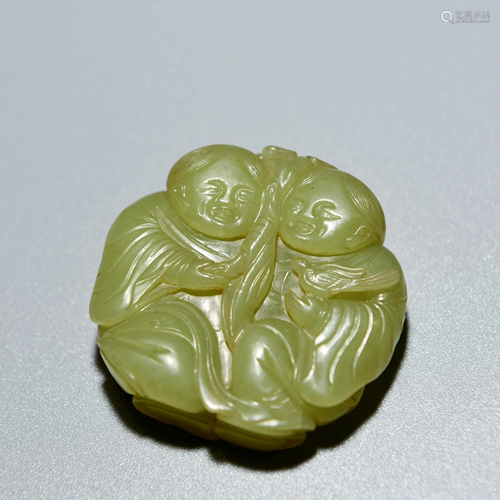 A Yellow Jade Carved Immortal Ornament