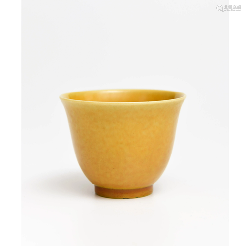 A Yellow Glazed Carved Porcelain Cup